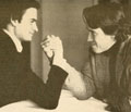 Kim Weiss and Arnold Schwarzenegger armwrestling (1978).